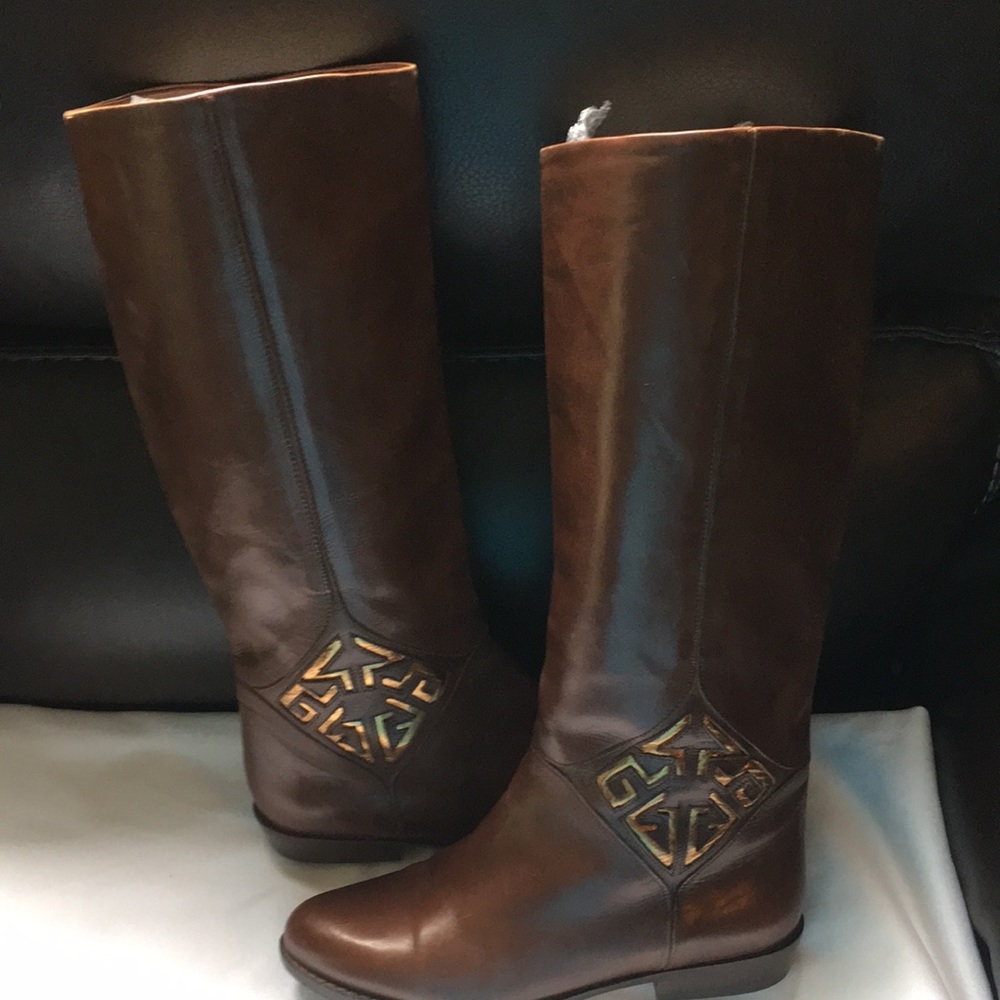 Ruggeri knee high boots.